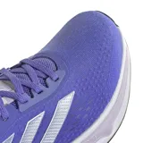Championes de running Adidas modelo Response Super, color violeta con detalles en gris claro y logo en tono menta. Presentan exterior de malla transpirable, mediasuela con tecnología Dreamstrike+ para mayor amortiguación y suela de caucho para un agarre óptimo.