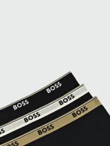 Bóxer negro de corte trunk con cintura elástica color beige y logo de la marca BOSS en marrón.