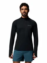 Buzo de media cremallera Columbia Polar Stealth Spring Ls Hz Omni-Shade color negro, de manga larga con orificios para los pulgares en los puños.