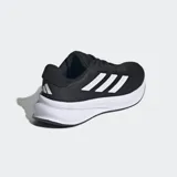 Championes de running Adidas modelo Response, color negro con las icónicas tres tiras laterales en blanco. Cuentan con una parte superior de malla transpirable, mediasuela de EVA para amortiguación y suela de caucho de gran agarre.