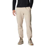 Pantalón de jogging Columbia modelo Marble Canyon, color beige, con cintura elástica ajustable con cordón, bolsillos laterales y bolsillo trasero. Presenta puños acanalados en los tobillos y logo de la marca bordado en la parte frontal.