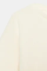 Camiseta de manga corta amplia y cuello redondo, de corte regular fit en color marrón.