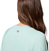 Remera de manga larga Columbia, color verde menta, con cuello redondo y diseño técnico de secado rápido con protección solar UPF 50.