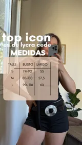 Top negro de lycra con escote asimétrico, un hombro descubierto y corbatín extraíble.