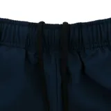 Pantalón deportivo Nike Dri-FIT azul marino, con corte ajustado y logo de la marca en la pierna izquierda.