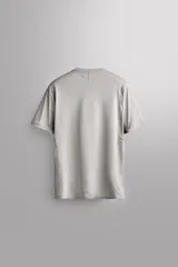 Remera de entrenamiento regular fit de Zara Athleticz, confeccionada en tejido técnico verde melange con estructura, ligero y elástico. Cuenta con tecnología Quick Dry nivel 2, cuello redondo, manga corta, costuras planas y detalle de logo estampado.