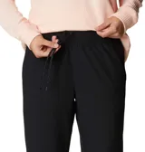 Pantalón de senderismo Columbia, color negro, con cintura ajustable, bolsillos laterales y tecnología Omni-Wick para absorción de humedad y secado rápido.