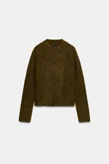 Jersey básico de punto con mezcla de lana y alpaca, de cuello redondo y manga larga, con textura jaspeada.