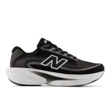 Championes de running New Balance modelo Ellipse, color negro con detalles en blanco y gris. Presentan entresuela con tecnología Fresh Foam X para mayor amortiguación y parte superior de malla técnica transpirable.
