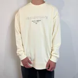 Buzo oversize color negro con estampa gráfica en la espalda que incluye palmeras, una medusa y tipografía alusiva al surf.