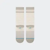 Medias Stance de largo medio color beige con rayas horizontales grises en la parte superior y diseño de Minnie Mouse haciendo deporte.