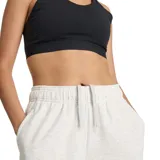 Pantalón de jogging New Balance French Terry Jogger, color gris claro melange, con cintura elástica con cordón ajustable y puños elásticos en los tobillos. Cuenta con bolsillos laterales y el logo pequeño bordado en la pierna.