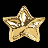 Anillo de bronce con forma de estrella, de diseño orgánico y textura irregular.