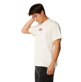 Remera Rip Curl de manga corta, color blanco, con pequeño estampado gráfico en el pecho en tonos naranja y azul.