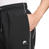 Pantalon deportivo Nike Air Hybrid de corte ajustado, color negro con detalles de costuras blancas en contraste. Cuenta con cintura elástica con cordón ajustable, puños elásticos en los tobillos y logo de la marca estampado en el muslo.