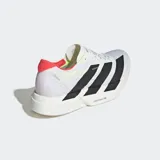 Championes Adidas Adizero Adios Pro 4, color blanco con detalles en negro y rojo.