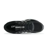 Championes de running Asics modelo Gel-Nagoya 4, color negro con detalles en blanco y gris. Presentan una estructura de malla transpirable, cordones ajustables y suela con tecnología de amortiguación.