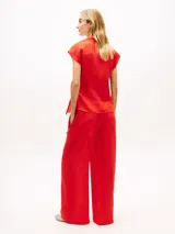 Blusa cruzada de lino Tommy Hilfiger color rojo, sin mangas, con cuello en V, cuello inglés y lazo anudable en el lateral.