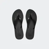 Ojotas Reef Bliss Nights color negro, con tira fina y logo de la marca en la plantilla.