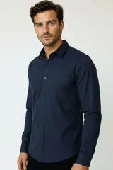 Buzo negro de cuello redondo con el texto "MAN EDITION" estampado en el pecho, de manga larga con puños elastizados y diseño liso.