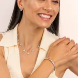 Collar de plata 925 con cadena de 40 cm más 5 cm de extensión, adornado con piedras de amazonita en forma de gotas.