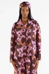 Camisa de manga larga fluida con estampado floral Broken Flowers, botones frontales a tono y cuello clásico.