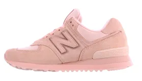 Championes urbanos New Balance modelo 574, color rosa, confeccionados en gamuza y material sintético, con el logo característico en los laterales y entresuela ENCAP para mayor amortiguación.