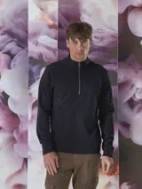 Sweater de polar azul marino con cuello alto y cierre metálico.