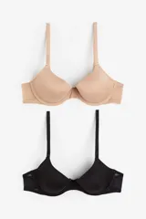 Pack de dos soutiens de microfibra y malla con breteles ajustables, copas acolchadas con aros y cierre de corchetes en la espalda. Incluye un soutien color beige y un soutien color negro.