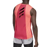 Musculosa de running Adidas Heat Ready color salmón, sin mangas, con cuello redondo y detalles reflectantes.