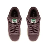 Zapatilla Puma Suede XL, color naranja quemado, con franja lateral (Formstrip) y cordones blancos. Presenta una suela de goma blanca gruesa.