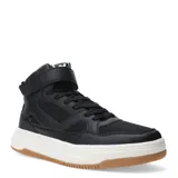 Championes de caña alta color negro, con cordones y ajuste de velcro en el tobillo. Suela blanca con base marrón.