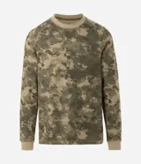 Remera de manga larga confeccionada en tejido waffle con textura. Presenta diseño camuflado en tonos verdes y estampa frontal con lettering Natural Balance.