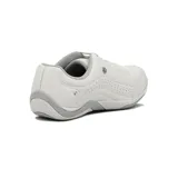 Championes Kolosh de mujer color blanco, con cordones y detalles de perforaciones en el lateral.