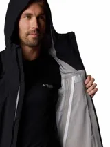 Campera impermeable Columbia Titanium Northwest Explorer de color negro, con capucha fija, cierre frontal sellado y bolsillos laterales con cremallera.