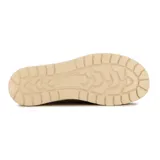 Zapato casual tipo slip-on color marrón, confeccionado en lona con costuras reforzadas y suela de goma color crema. Presenta una etiqueta lateral con la marca Country.