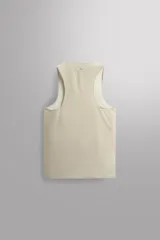Musculosa deportiva Zara Athleticz de tejido ligero y elástico con cuello redondo y aberturas laterales en el bajo.
