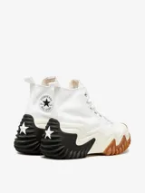 Championes de caña alta Converse con diseño de plataforma ondulada. Presentan una parte superior de lona de algodón orgánico, con el icónico parche de estrella en el lateral. La entresuela es de espuma CX para mayor comodidad, con una suela dentada de goma en colores contrastantes negro y marrón.