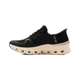Championes deportivos Skechers modelo Slip-Ins Glide Step Pro, color negro con entresuela en tono rosado claro y detalles metálicos. Confeccionados en malla transpirable con tecnología Slip-Ins y suela con amortiguación.