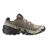 Championes de trail running Salomon Speedcross 6, color marrón y negro, diseñados con suela de gran tracción, sistema de cordones de ajuste rápido Quicklace y parte superior técnica ligera y resistente.
