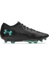 Championes de fútbol Under Armour UA Magnetico Elite Mansory, color negro con detalles en verde menta. Presentan parte superior UA Clone con impresión 3D, cuello de punto y suela con tacos mixtos para superficies naturales firmes.