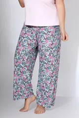 Pantalón de tiro alto confeccionado en seda fría estampada con flores. Elástico en cintura y corte ancho.