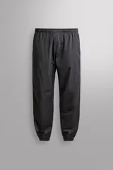 Pantalón slim fit Zara Athleticz de tejido técnico ligero y elástico en color negro, con cintura elástica ajustable, bolsillos con cremallera y bajos con elástico.