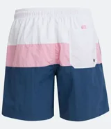 Bermuda de baño para hombre, color azul con recortes en bloques de color (azul más claro y rosa pálido). Presenta cintura elástica con cordón de ajuste y es de tejido plano de poliamida.