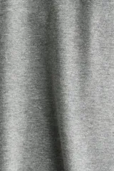 Pantalón gris melange de punto de algodón, con cintura ancha plegable y perneras de corte recto y acabado acampanado.
