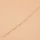 Pulsera de plata 925 con cadena de eslabones trenzados y pequeñas esferas intercaladas a lo largo de toda la pieza.