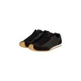 Championes Loewe modelo Ballet Runner 2.0 en color negro, confeccionados en una combinación de cuero y gamuza, con suela de goma en tono tostado y puntera redondeada revestida.