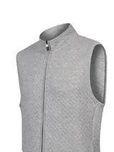 Chaleco gris melange con textura acolchada de rombos, cuello alto y cierre frontal de cremallera. Presenta un pequeño parche bordado con silueta de pato en el pecho.