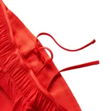 Short deportivo New Balance RC Seamless de dama, color rojo, con logo estampado en la pierna. Confeccionado en tejido elástico con tecnología NB Dry.