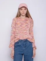 Sweater de tejido de punto multicolor en tonos verde, lila y blanco. Es de manga larga y corte holgado.